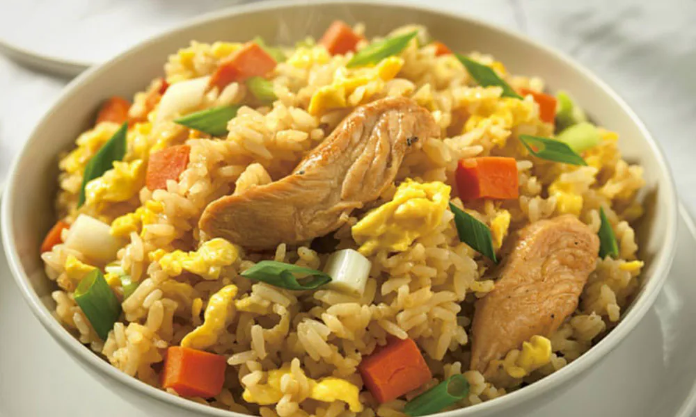 Savory chicken fried rice with eggs, carrots, and scallions at Sumo Ramen CO, a Chinese Restaurant in Fayetteville